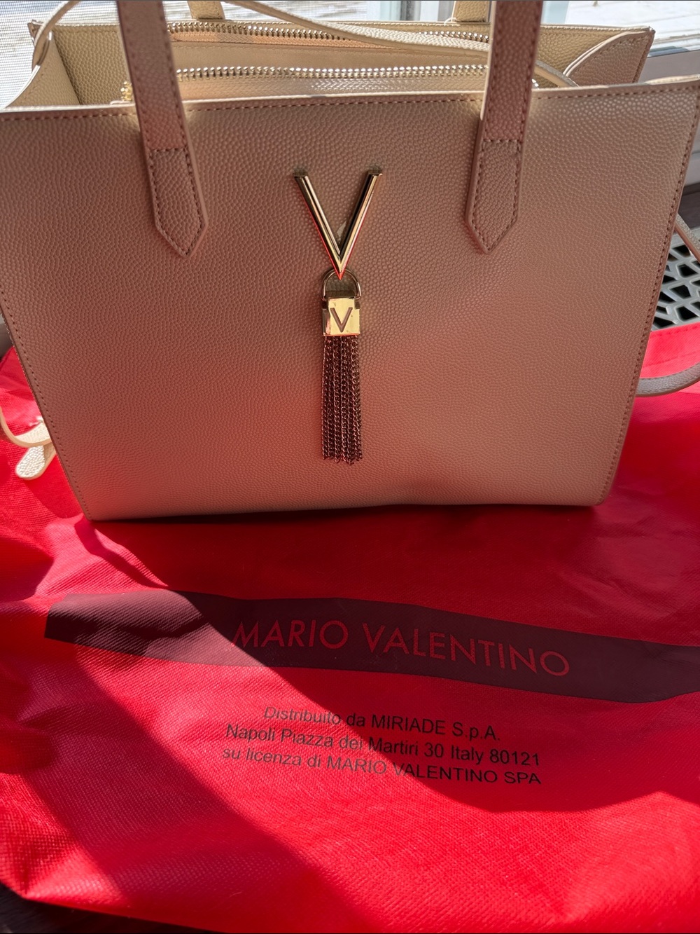 Mario Valentino beige leather shoulder tote with gold V tassel